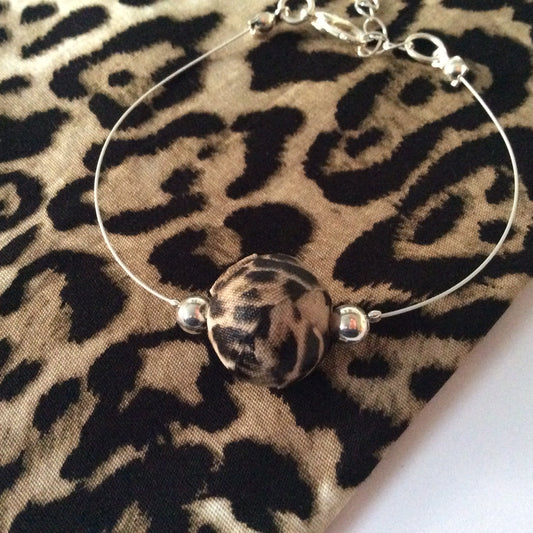 Bracelet handcrafted animal print leopard themed fabric silver jewellery vintage vibe
